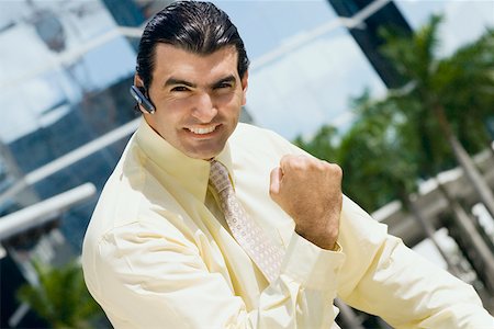 simsearch:625-01096675,k - Portrait of a businessman making a fist and looking excited Stock Photo - Premium Royalty-Free, Code: 625-01748360