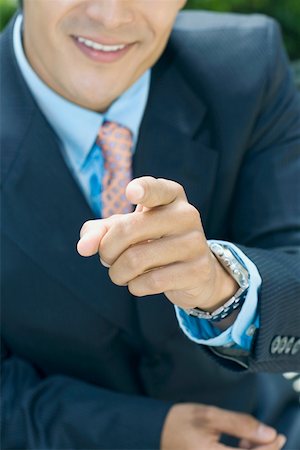 simsearch:625-01096675,k - Close-up of a businessman pointing forward Stock Photo - Premium Royalty-Free, Code: 625-01748371