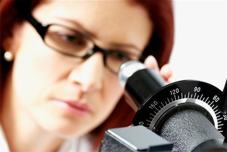 Close-up of a female optometrist using a phoropter Foto de stock - Sin royalties Premium, Código: 625-01749197