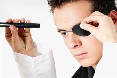 simsearch:625-02267926,k - Optometrist examining a young man's eye Foto de stock - Sin royalties Premium, Código: 625-01749223