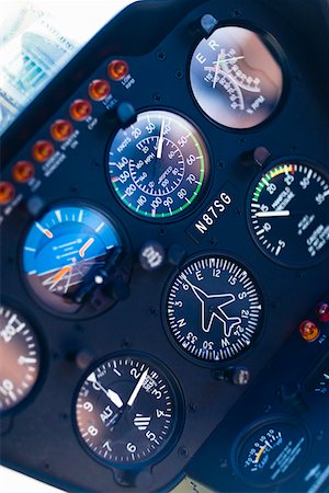 Close-up of dial gauges of an airplane Fotografie stock - Premium Royalty-Free, Codice: 625-01749524