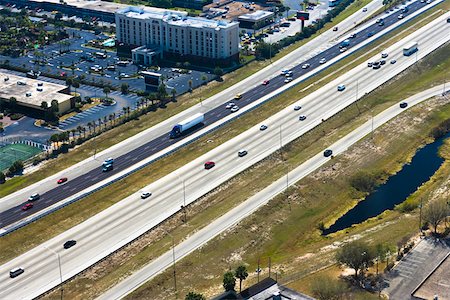 Aerial view of vehicles moving on multiple lane highways, Orlando, Florida, USA Stock Photo - Premium Royalty-Free, Code: 625-01749624