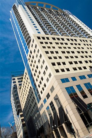 Low angle view of skyscrapers in a city, Orlando, Florida, USA Stock Photo - Premium Royalty-Free, Code: 625-01749663