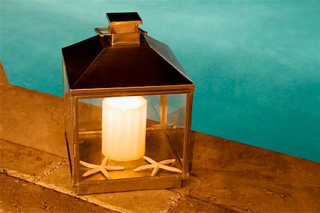 swimmingpool inside nobody - Close-up of a lantern at the poolside Stock Photo - Premium Royalty-Free, Code: 625-01743632