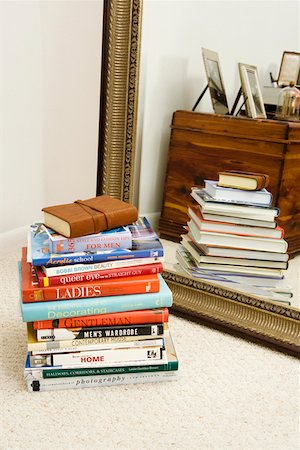 simsearch:625-01743767,k - Stack of books in front of a mirror Stock Photo - Premium Royalty-Free, Code: 625-01743737