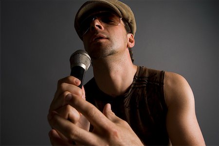 Close-up of a male singer singing Stock Photo - Premium Royalty-Free, Code: 625-01743963