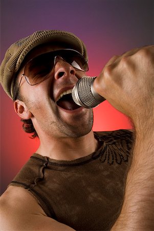 Close-up of a male singer singing Stock Photo - Premium Royalty-Free, Code: 625-01743999