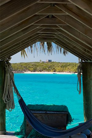 simsearch:625-01749997,k - Close-up of a hammock tied to a pier, Exuma, Bahamas Foto de stock - Royalty Free Premium, Número: 625-01750007