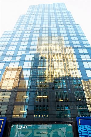 simsearch:625-01750194,k - Low angle view of a building in a city, Times Square, Manhattan, New York City, New York State, USA Foto de stock - Sin royalties Premium, Código: 625-01750247