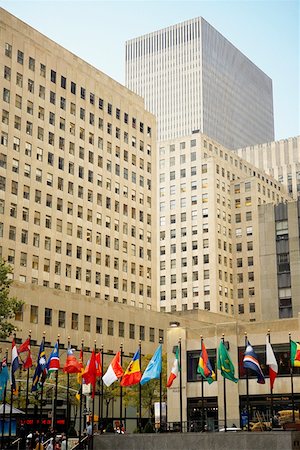 simsearch:625-01750194,k - Flags in front of a building, Rockefeller Center, Manhattan, New York City, New York State, USA Foto de stock - Sin royalties Premium, Código: 625-01750300