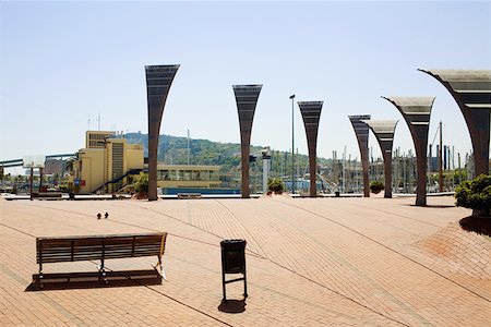 Empty bench near sculptures in a city, Barcelona, Spain Stock Photo - Premium Royalty-Free, Code: 625-01750494