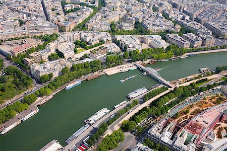 france city road and building pic - Aerial view of a river passing through a city, Passerelle Debilly, Seine River, Paris, France Stock Photo - Premium Royalty-Free, Code: 625-01750603