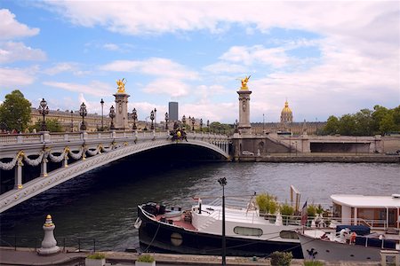 simsearch:625-01095342,k - Arch bridge over a river, Ponte Alexander III, Seine River, Paris France Fotografie stock - Premium Royalty-Free, Codice: 625-01750623