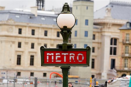 paris streetlight - Signboard on a lamppost with buildings in the background, Paris, France Stock Photo - Premium Royalty-Free, Code: 625-01750631