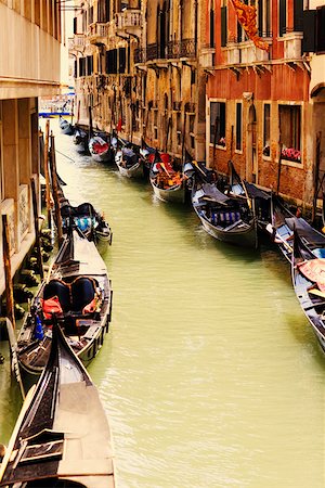 docked gondola buildings - Gondolas docked on both sides of a canal, Venice, Italy Stock Photo - Premium Royalty-Free, Code: 625-01750783