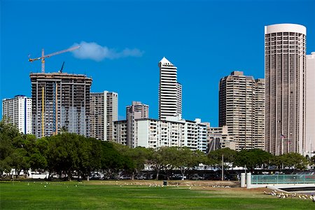 simsearch:625-01751232,k - Skyscrapers in a city, Honolulu, Oahu, Hawaii Islands, USA Foto de stock - Sin royalties Premium, Código: 625-01750979