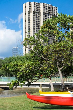 simsearch:625-01751116,k - Low angle view of a skyscraper in a city, Honolulu, Oahu, Hawaii Islands, USA Stock Photo - Premium Royalty-Free, Code: 625-01750984