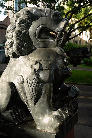 Close-up of a lion statue in a park, Honolulu, Oahu, Hawaii Islands, USA Stock Photo - Premium Royalty-Free, Code: 625-01751019