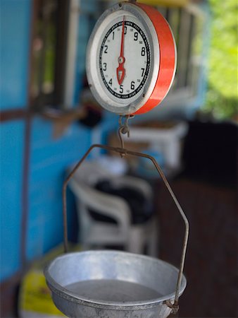 simsearch:625-01751908,k - Close-up of a weighing scale in a store, Providencia, Providencia y Santa Catalina, San Andres y Providencia Department, Colombia Foto de stock - Royalty Free Premium, Número: 625-01751546