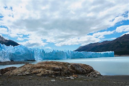 Glaciers in front of mountains, Moreno Glacier, Argentine Glaciers National Park, Lake Argentino, El Calafate, Patagonia Stock Photo - Premium Royalty-Free, Code: 625-01751714