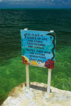 signage on the beach - Signboard at the seaside, Providencia, Providencia y Santa Catalina, San Andres y Providencia Department, Colombia Stock Photo - Premium Royalty-Free, Code: 625-01751759