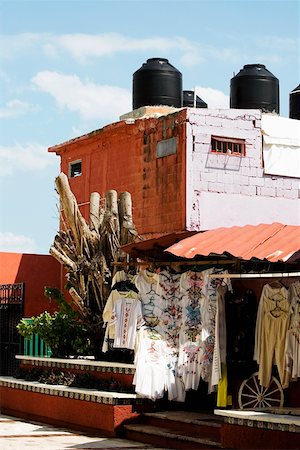 simsearch:625-01751908,k - Clothes hanging in a store, Cancun, Mexico Foto de stock - Royalty Free Premium, Número: 625-01751898