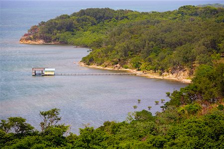 roatan - High angle view of a tourist resort, Paya Bay Resort, Roatan, Bay Islands, Honduras Foto de stock - Royalty Free Premium, Número: 625-01751937