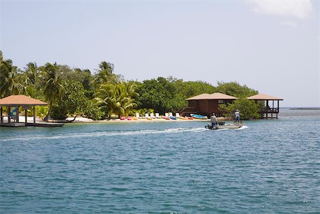 simsearch:841-03067555,k - Beach hut on the beach, Sandy Bay Roatan, Bay Islands, Honduras Foto de stock - Sin royalties Premium, Código: 625-01751933