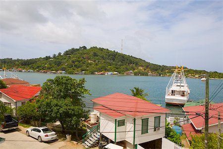 High angle view of a house on the coast, Jonesville, Roatan, Bay Islands, Honduras Stock Photo - Premium Royalty-Free, Code: 625-01751951
