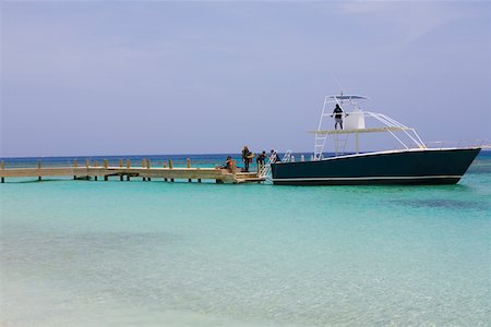 simsearch:625-01747341,k - Tourboat in the sea, West Bay Beach, Roatan, Bay Islands, Honduras Foto de stock - Sin royalties Premium, Código: 625-01751963