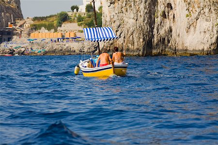 simsearch:625-01751994,k - Rear view of two people in a boat Capri, Campania, Italy Stock Photo - Premium Royalty-Free, Code: 625-01752053