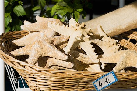 Close-up of starfish in a basket, Greece Stock Photo - Premium Royalty-Free, Code: 625-01752450