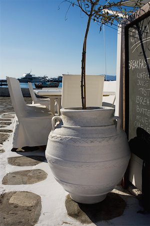 food processing greece - Decorative urn in a restaurant, Mykonos, Cyclades Islands, Greece Stock Photo - Premium Royalty-Free, Code: 625-01752513