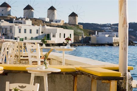 flowers greece - Chairs and tables in a restaurant Mykonos, Cyclades Islands, Greece Stock Photo - Premium Royalty-Free, Code: 625-01752550