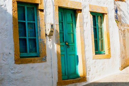 Closed door of a house, Patmos, Dodecanese Islands, Greece Stock Photo - Premium Royalty-Free, Code: 625-01752588