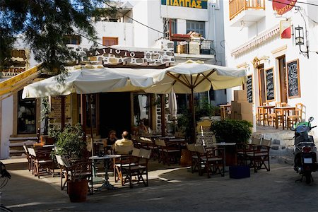 food processing greece - Sidewalk cafe in a city, Patmos, Dodecanese Islands, Greece Stock Photo - Premium Royalty-Free, Code: 625-01752610