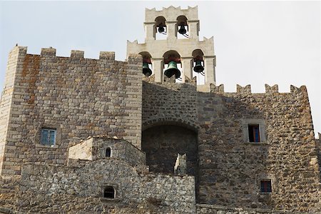 Low angle view of a church, Monastery of St. John the Divine, Patmos, Dodecanese Islands, Greece Stock Photo - Premium Royalty-Free, Code: 625-01752630