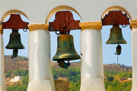 Bells hanging in a church, Monastery of St. John the Divine, Patmos, Dodecanese Islands, Greece Stock Photo - Premium Royalty-Free, Code: 625-01752645
