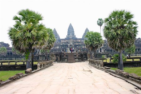 Walkway leading towards a temple, Angkor Wat, Siem Reap, Cambodia Stock Photo - Premium Royalty-Free, Code: 625-01752677