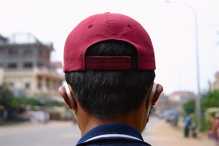 phnom penh buildings - Rear view of a man, Phnom Penh, Cambodia Stock Photo - Premium Royalty-Free, Code: 625-01752724