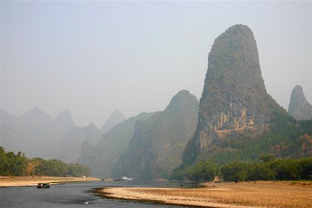 simsearch:625-01753066,k - Bateau dans une rivière Li rivière, collines de Guilin, Guilin, Chine Photographie de stock - Premium Libres de Droits, Code: 625-01752761