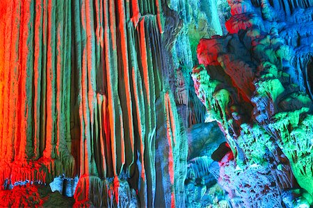 Stalactites and stalagmites in a cave, Seven Star Cave, Guilin, China Stock Photo - Premium Royalty-Free, Code: 625-01752776