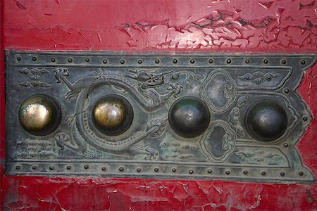 rivets - Close-up of a metal engraving on a wall, Beijing, China Stock Photo - Premium Royalty-Free, Code: 625-01752795