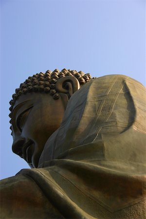 Low angle view of a statue of Buddha, Tian Tan Buddha, Po Lin Monastery, Ngong Ping, Lantau, Hong Kong, China Foto de stock - Sin royalties Premium, Código: 625-01752843