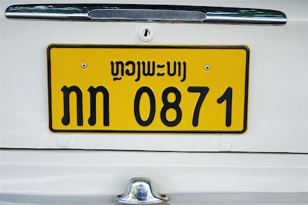 Gros plan d'une plaque d'immatriculation sur une voiture, Vientiane, Laos Photographie de stock - Premium Libres de Droits, Code: 625-01752892