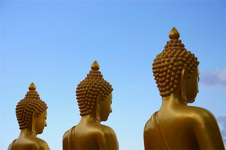 Close-up of three statues of Buddha side by side, Chiang Rai, Thailand Stock Photo - Premium Royalty-Free, Code: 625-01752996