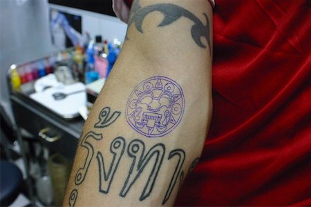 simsearch:625-01753059,k - Close-up of tattoos on a person's hand, Bangkok, Thailand Stock Photo - Premium Royalty-Free, Code: 625-01753029