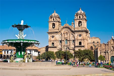 plaza de armas - Fontaine en face d'une église, La Compania, Plaza-De-Armas, Cusco, Pérou Photographie de stock - Premium Libres de Droits, Code: 625-01753302