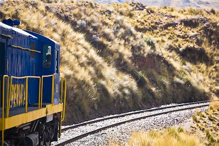 simsearch:625-01753293,k - Train passing through a landscape Puno, Cuzco, Peru Fotografie stock - Premium Royalty-Free, Codice: 625-01753357