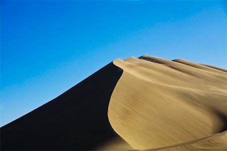 simsearch:625-01751610,k - Sand dunes in a desert, Huacachina, Ica, Ica Region, Peru Stock Photo - Premium Royalty-Free, Code: 625-01753452